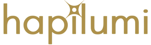 Gold logo of 'hapilumi' on a white background, symbolizing how to be happy and enlightened, to maximize happiness